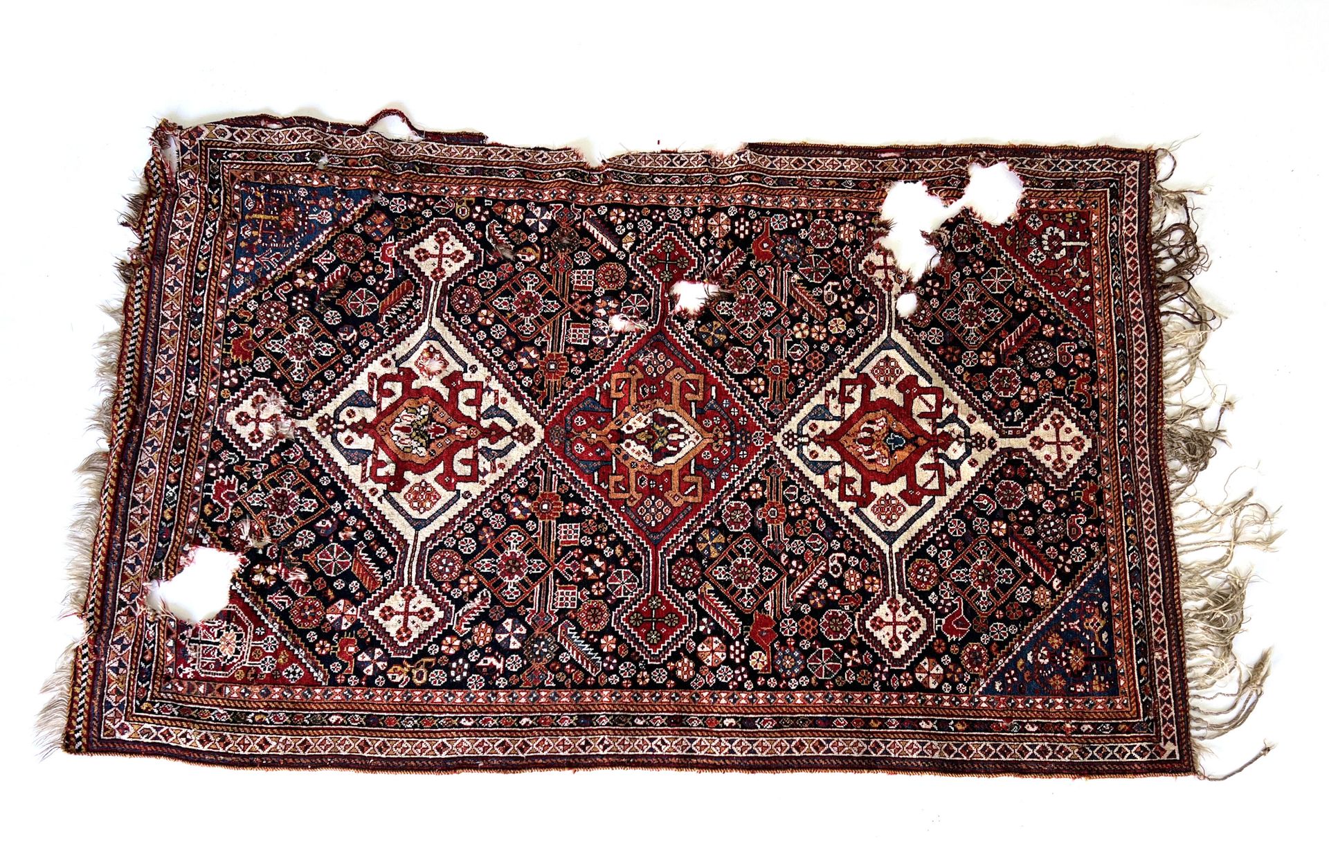 Null RUGS OF THE EAST 

Kashgai carpet, 19th century, white and red tones, midni&hellip;