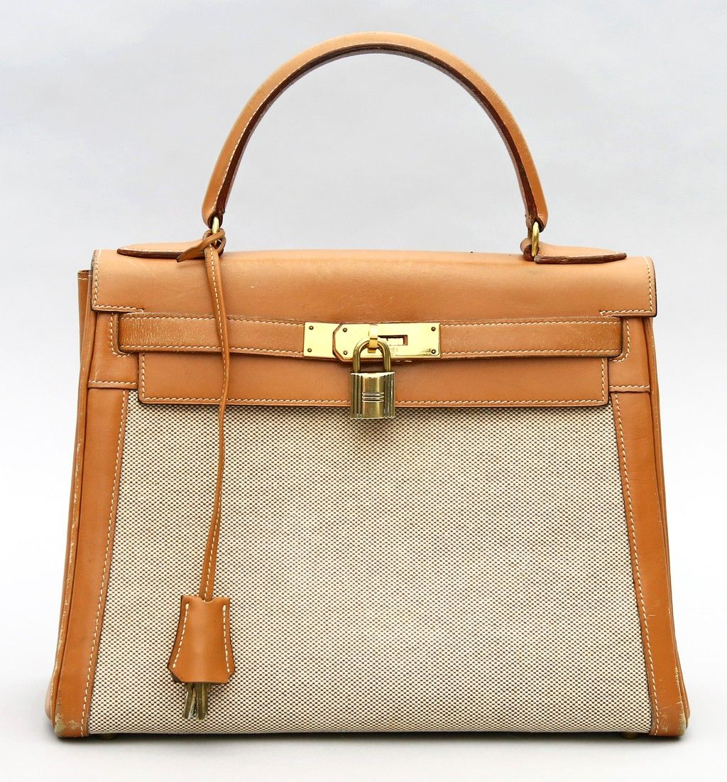 "Kelly 28", Hermès. Vintage Kelly bag in unusual mix of materials: gold-colored &hellip;