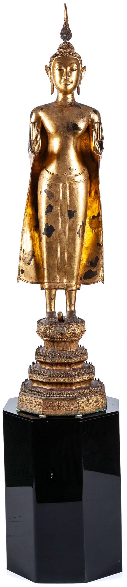 Null A Thai gilt-bronze standing figure of Buddha on a black lacquer stand, 18th&hellip;