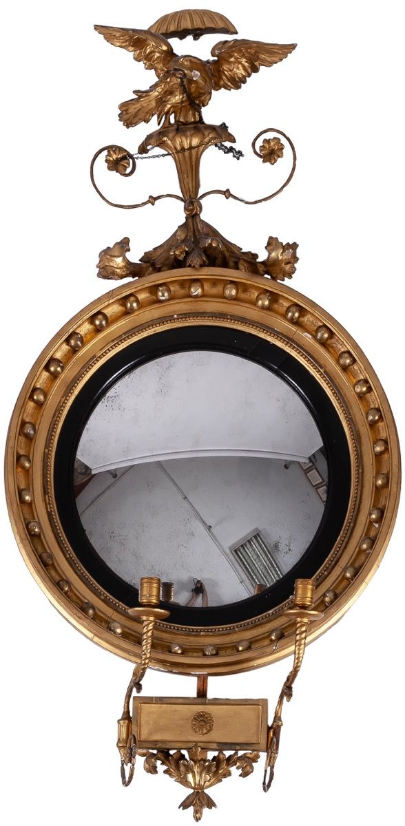 Miroir convexe en bois doré sculpté de style Régence, su…