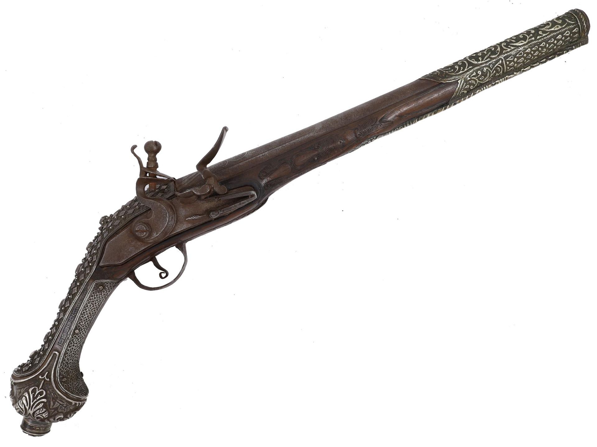 Null 
一把长的燧发枪，有凿银的配件和金属丝镶嵌。奥斯曼帝国，约1800年。这支华丽的手枪可能是18世纪末在巴尔干半岛制造的。它有一个有棱有角的枪管，并入一&hellip;