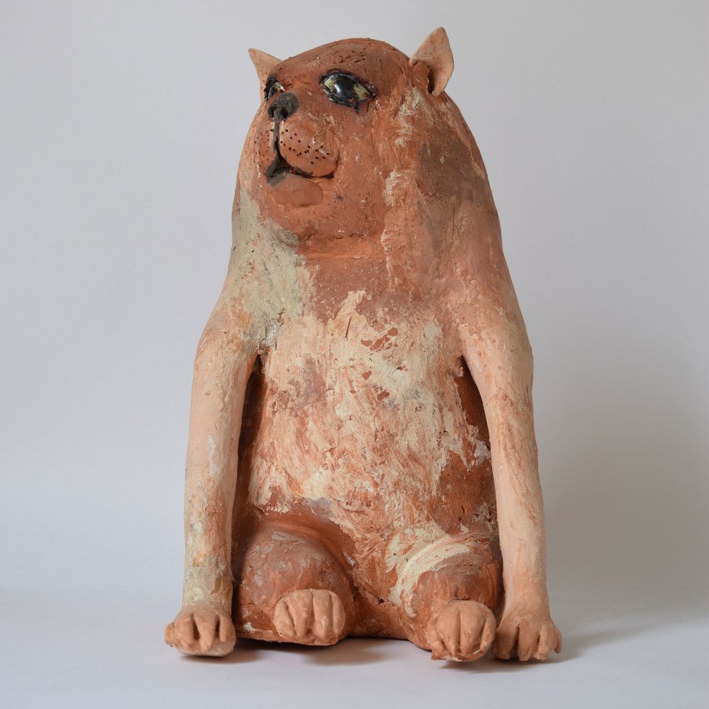 Null Sitting dog: terracotta figurine. H: 24 cm.