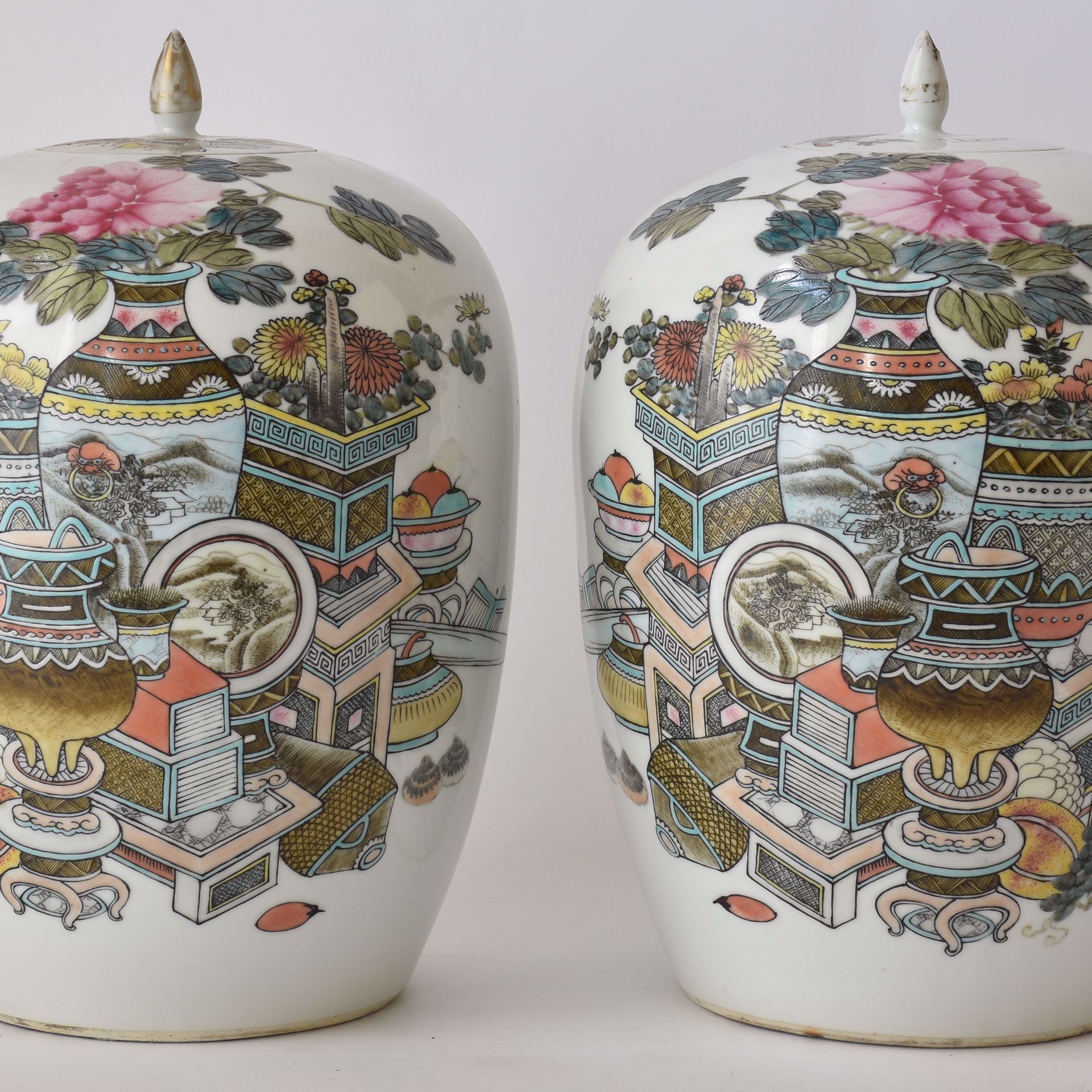 Pair of Ginger Jars with decoration of garden vases. China, marked.