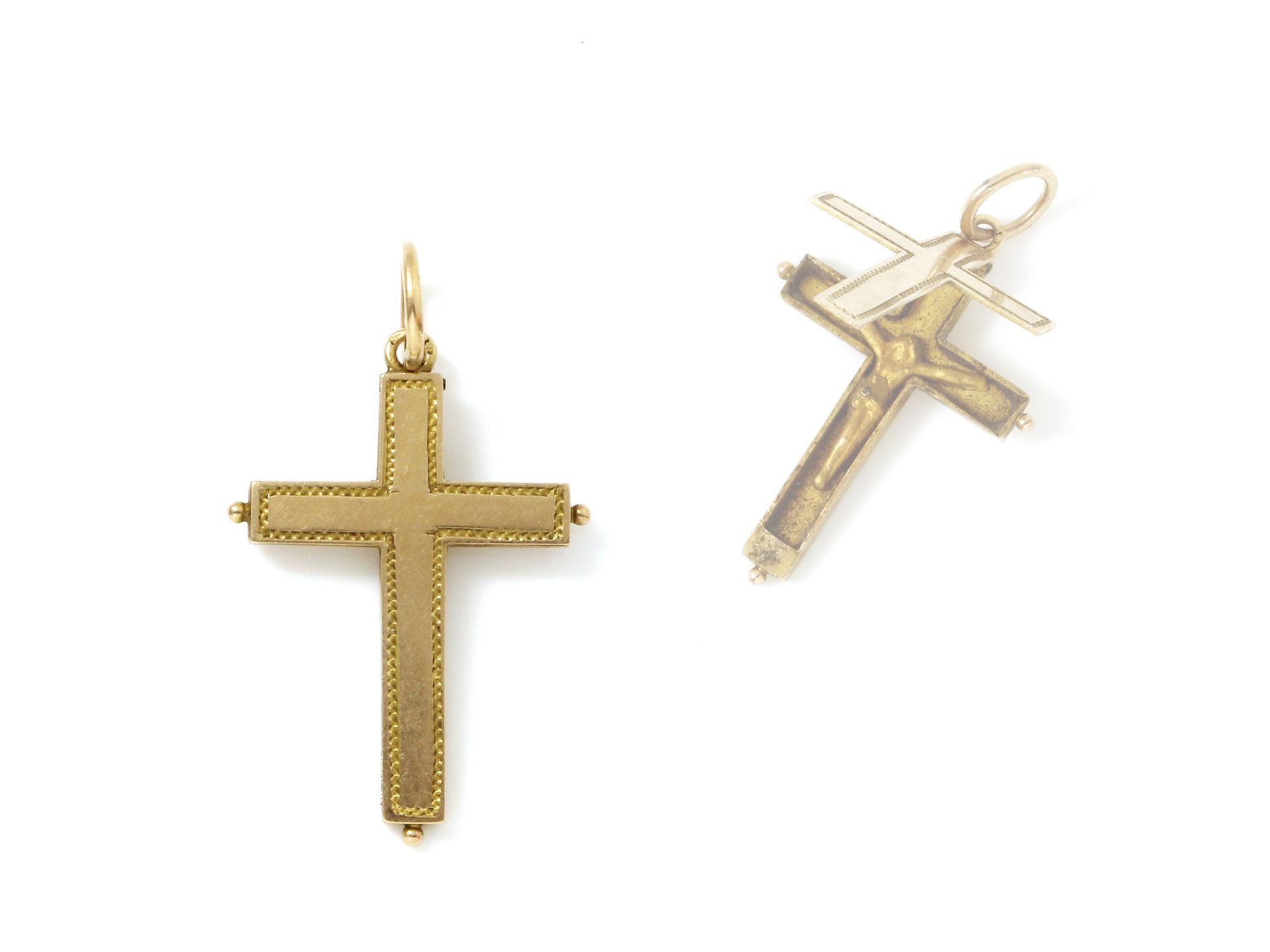 Null 七十五万分之一的黄金吊坠，代表一个用铰链打开的十字架，露出一个基督。带悬挂环。

毛重：1.90克。尺寸：高2.5 x 宽1.8厘米。