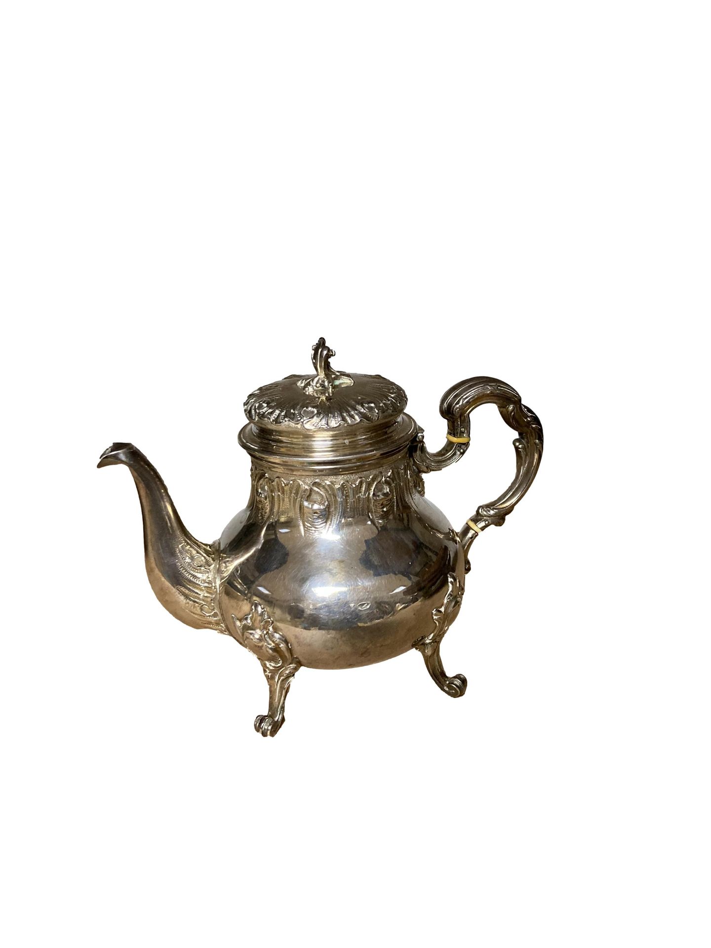 Null Silver four-legged teapot with rocaille decoration

Minerva hallmark

H. 14&hellip;