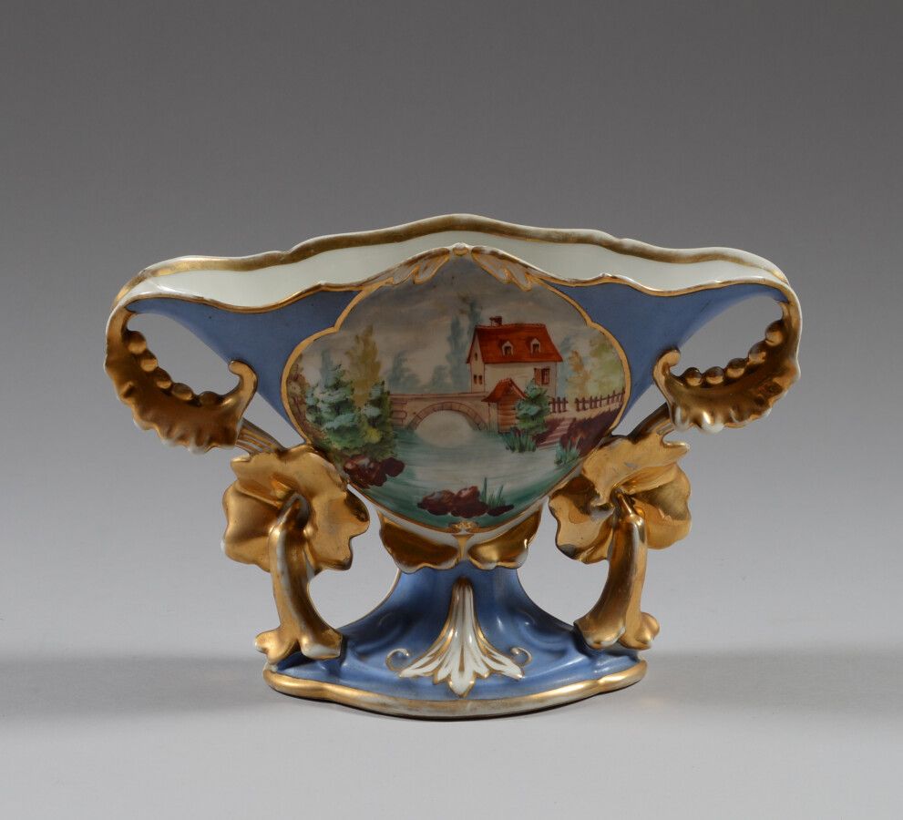 Null A polychrome and gold porcelain vase decorated with a house and a bridge, t&hellip;