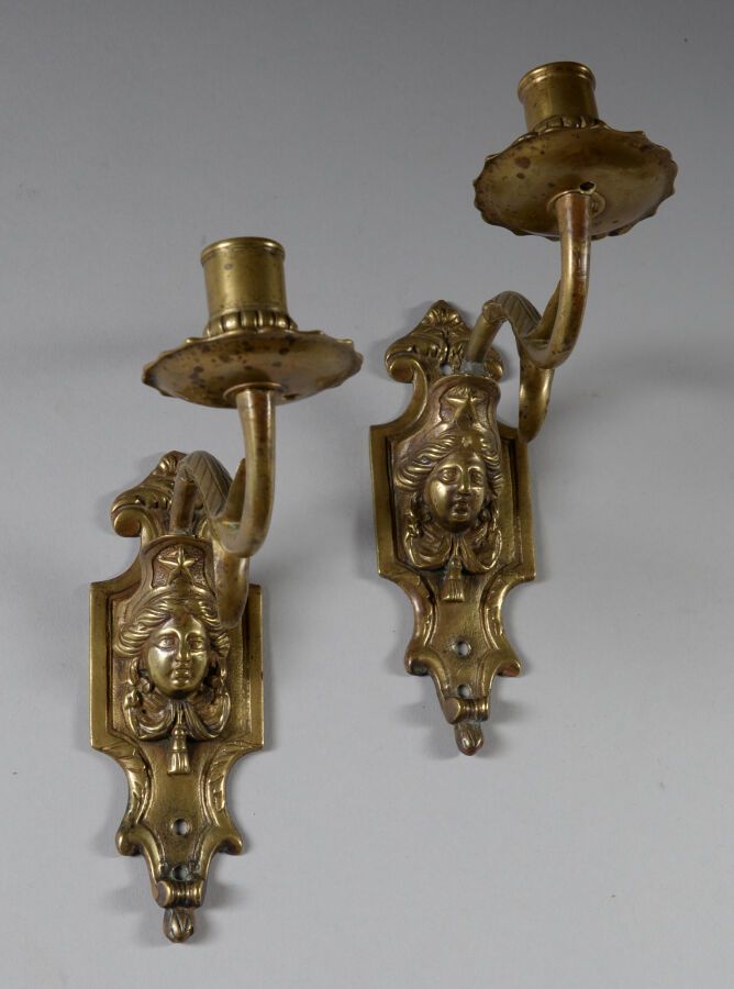 Pair of small bronze sconces with one arm of light and a woman's head decoration&hellip;