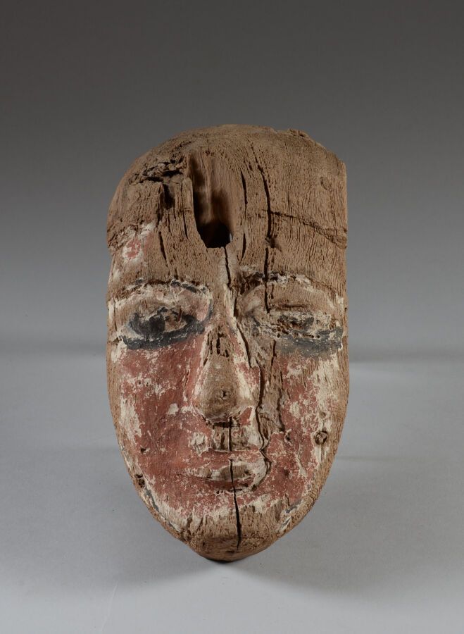 Null EGYPT.

Wood, stucco, pigments.

Mask from a sarcophagus representing an Eg&hellip;
