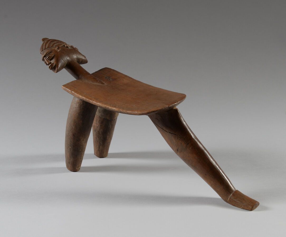 Null LOBI, Burkina Faso.

Hardwood, patina of use, leather.

Tripod stool with t&hellip;