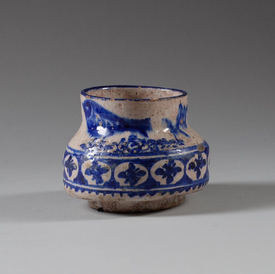 Null IZNIK QAJAR, Persia

Enameled stoneware vase painted with birds and flowers&hellip;