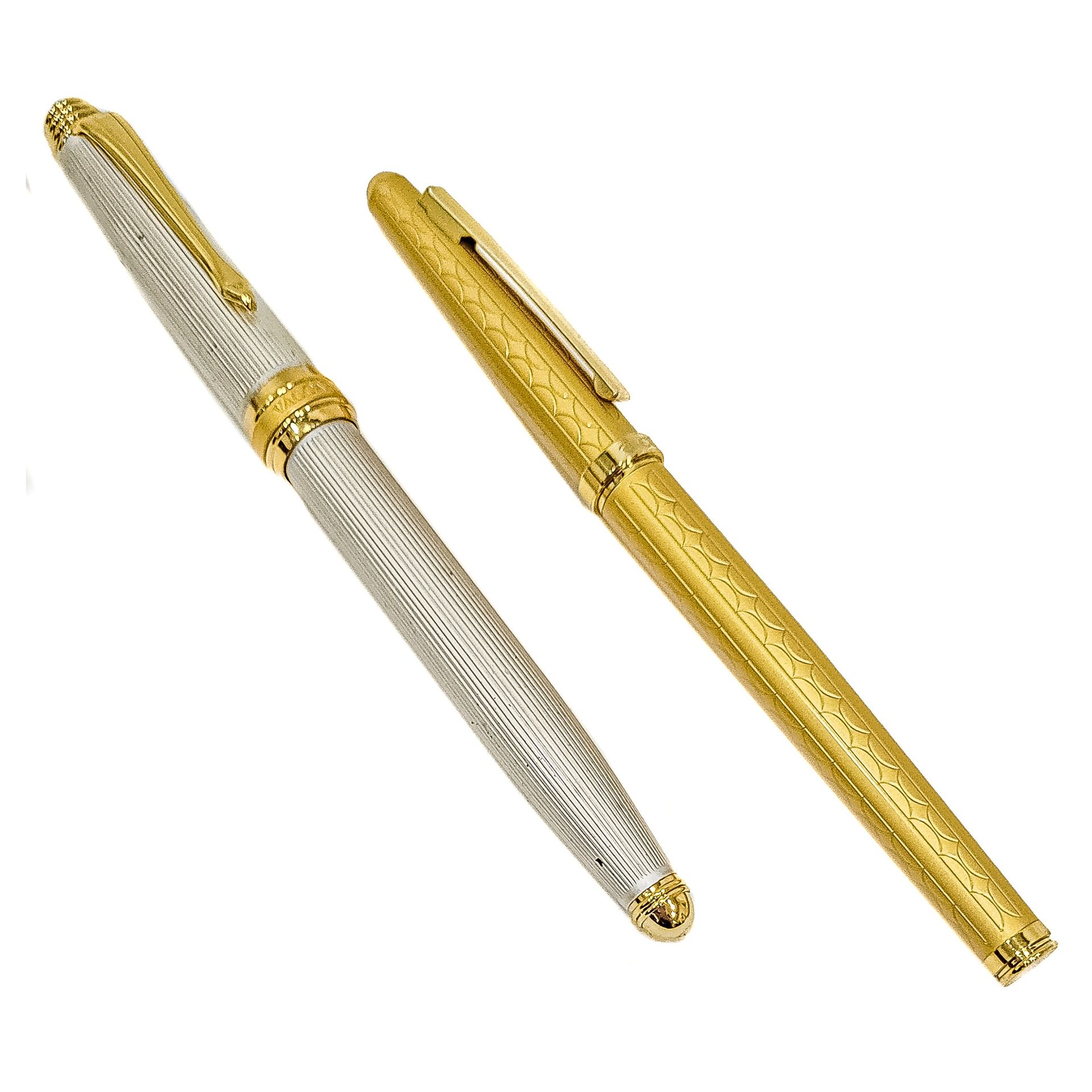 Set de deux stylos plume Vaccaro en métal doré et argent…