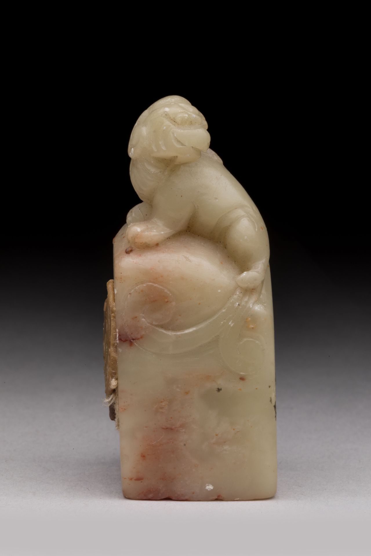 Null 
CHINA - About 1900 


Two beige soapstone seals of scholars, one surmounte&hellip;
