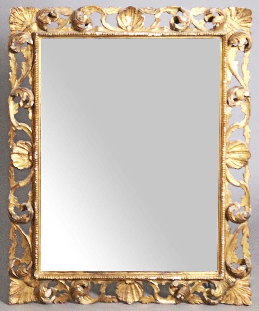 Specchiera in legno dorato ed intagliato Miroir en bois doré et sculpté de volut&hellip;