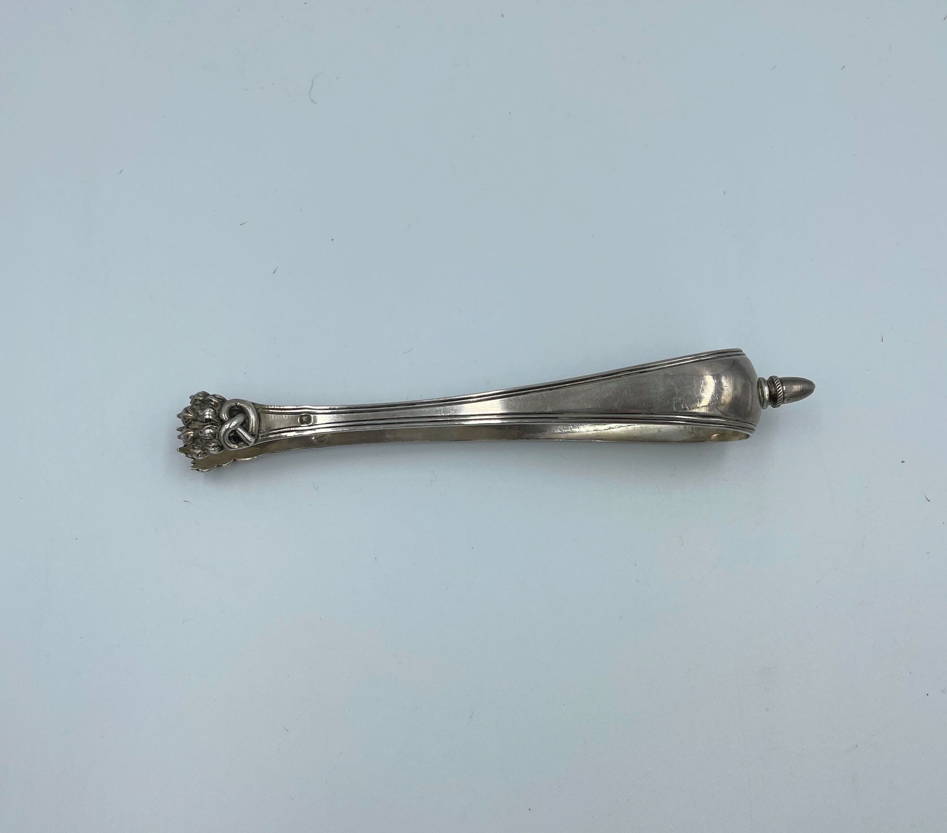 Null Sugar tongs in silver (925) with lion's paws decoration, engraved

Weight :&hellip;