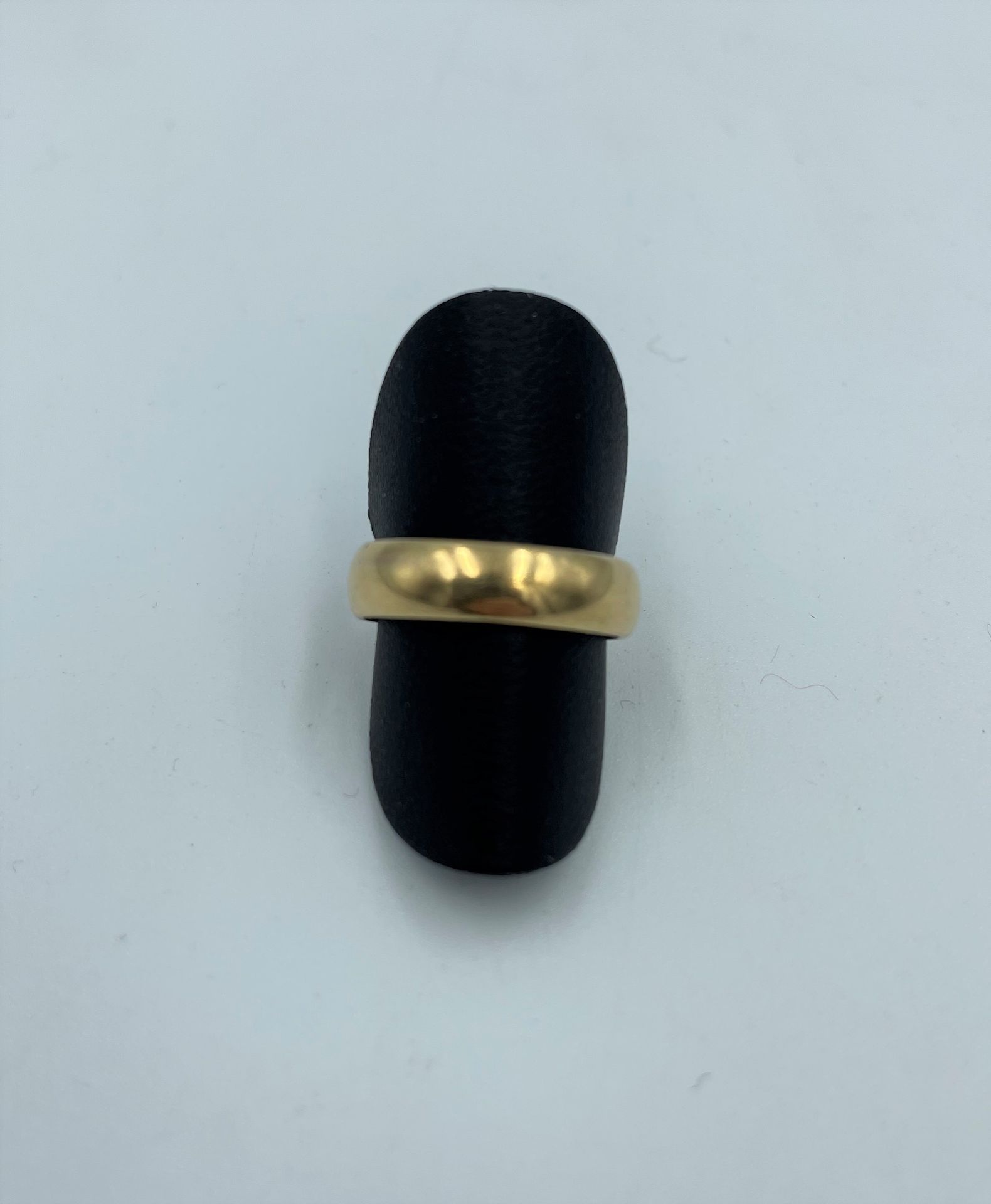 Null Anello nuziale in oro giallo 18 carati (750 millesimi)
TDD: 53, Peso: 4,9 g