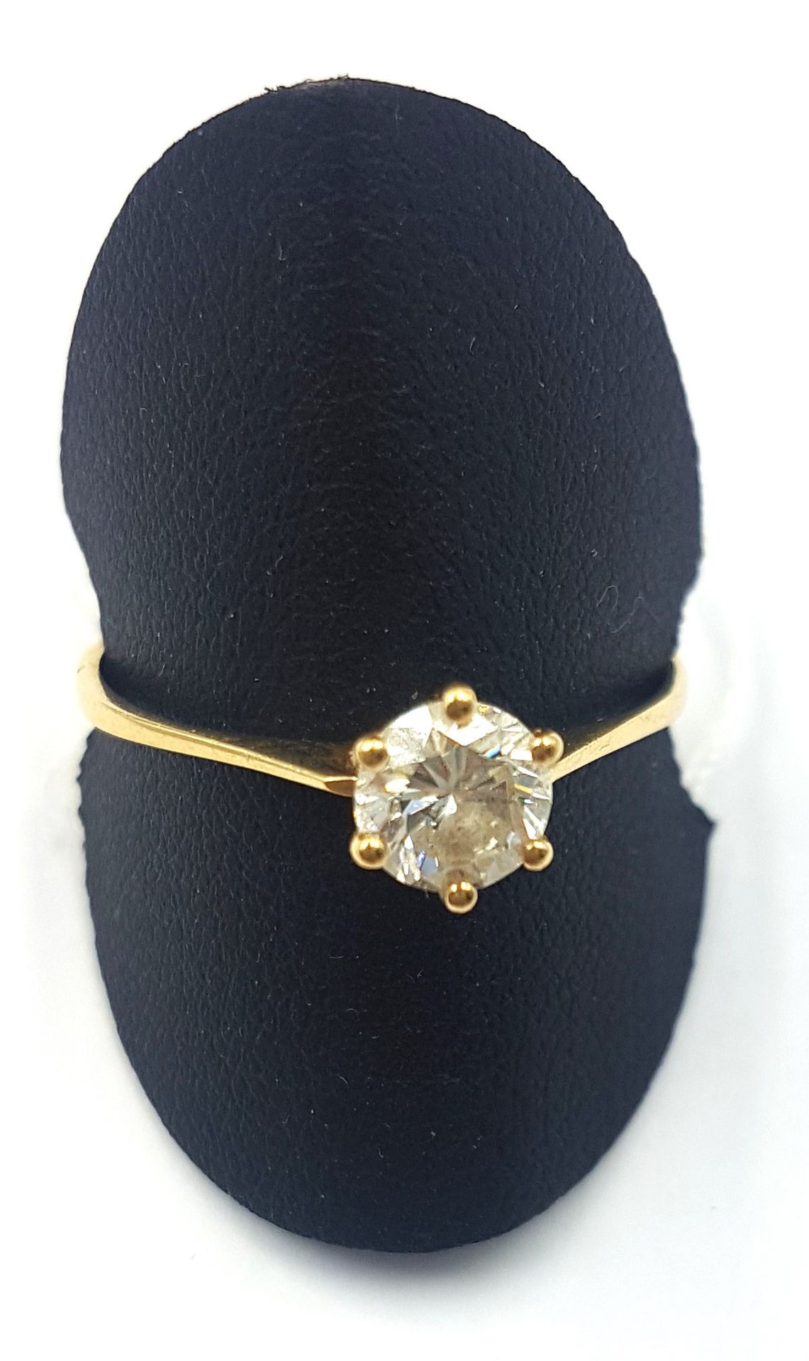Null Bague monture en or jaune 18k (750 ) ornée d'un diamant solitaire d'environ&hellip;