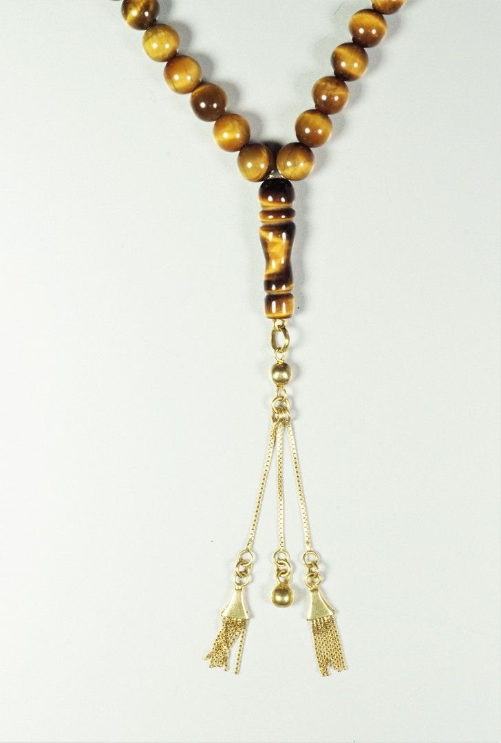 Null Rosary in 18 K gold (750millionths) and tiger eye pearls Weight but 43.2 gr&hellip;