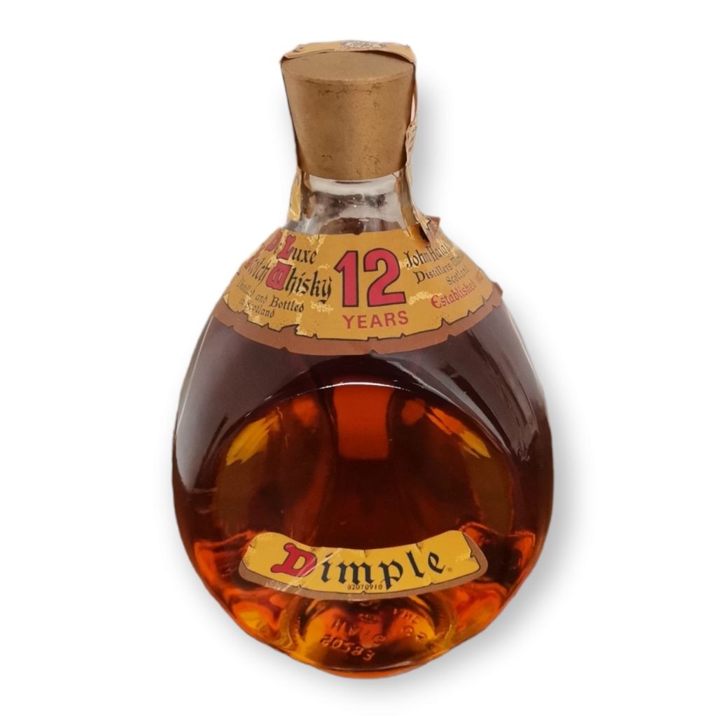 DIMPLE 12 ANOS DIMPLE 12 YEARS old 0.75 liter bottle of whiskey. Seventies.