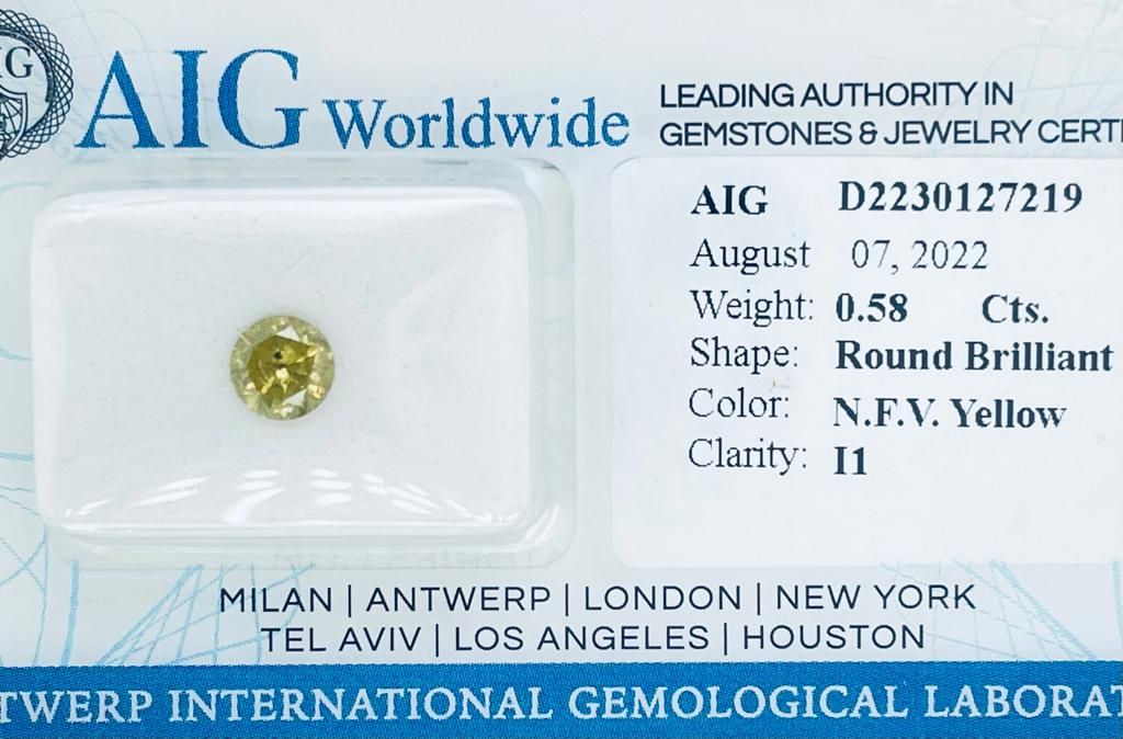 Null 1 DIAMOND 0.58 CT FANCY VIVID YELLOW - I1 - BRILLIANT CUT - AIG CERTIFICATE&hellip;