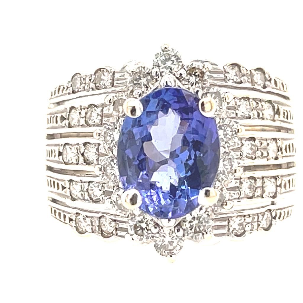 Null 14KT WHITE GOLD TANZANITE AND DIAMOND RING 9.47GR SIZE: 8 MAIN STONE: NATUR&hellip;
