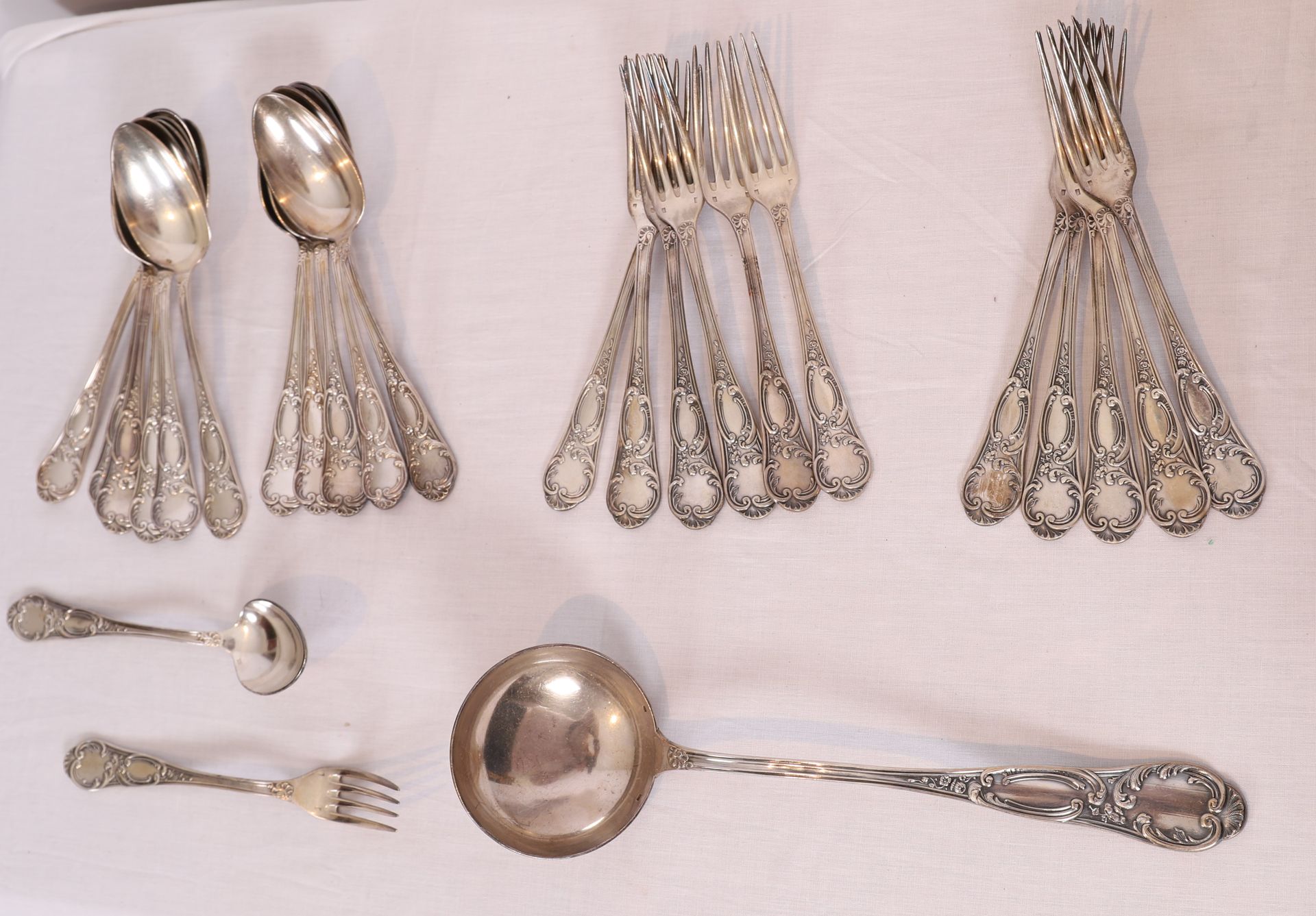 Null 12 SILVER PLATED CUTLERY WITH SCROLLS AND SHELLS AND A LADLE OF THE SAME MO&hellip;