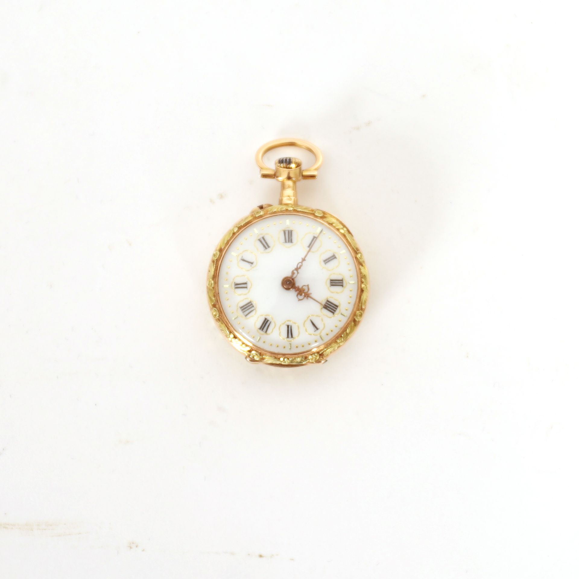 Null SMALL GOLD POCKET WATCH 

Dial with Roman numerals 

Weight : 15 grs