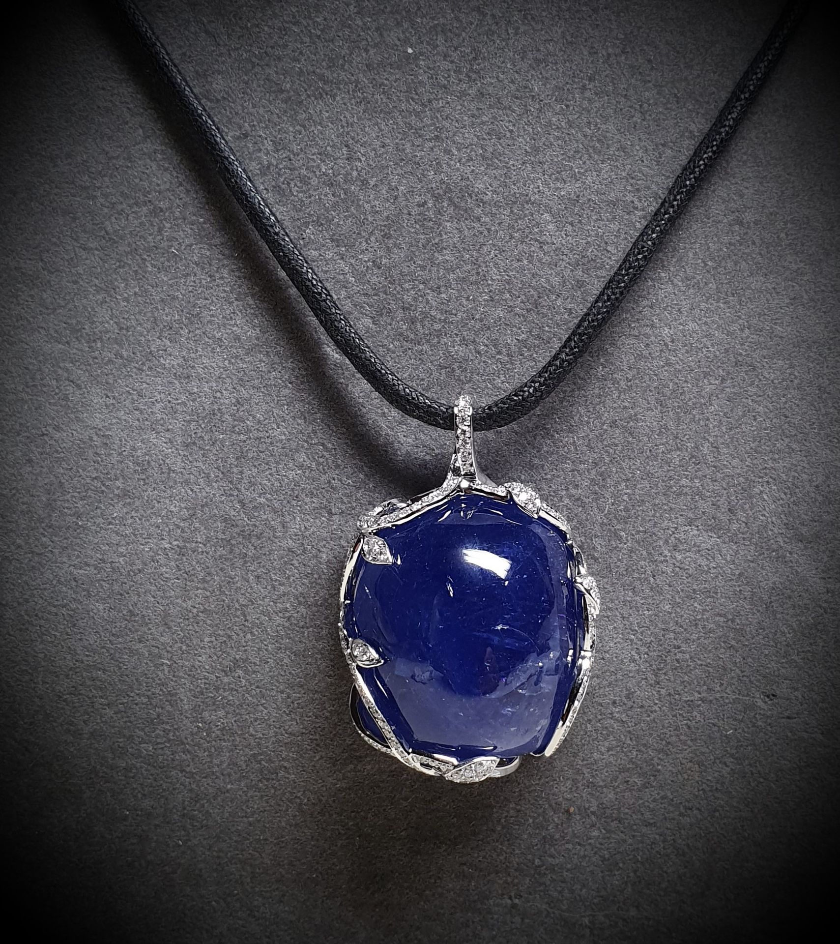 Null White gold pendant centered with a very important NATURAL Tanzanite cushion&hellip;