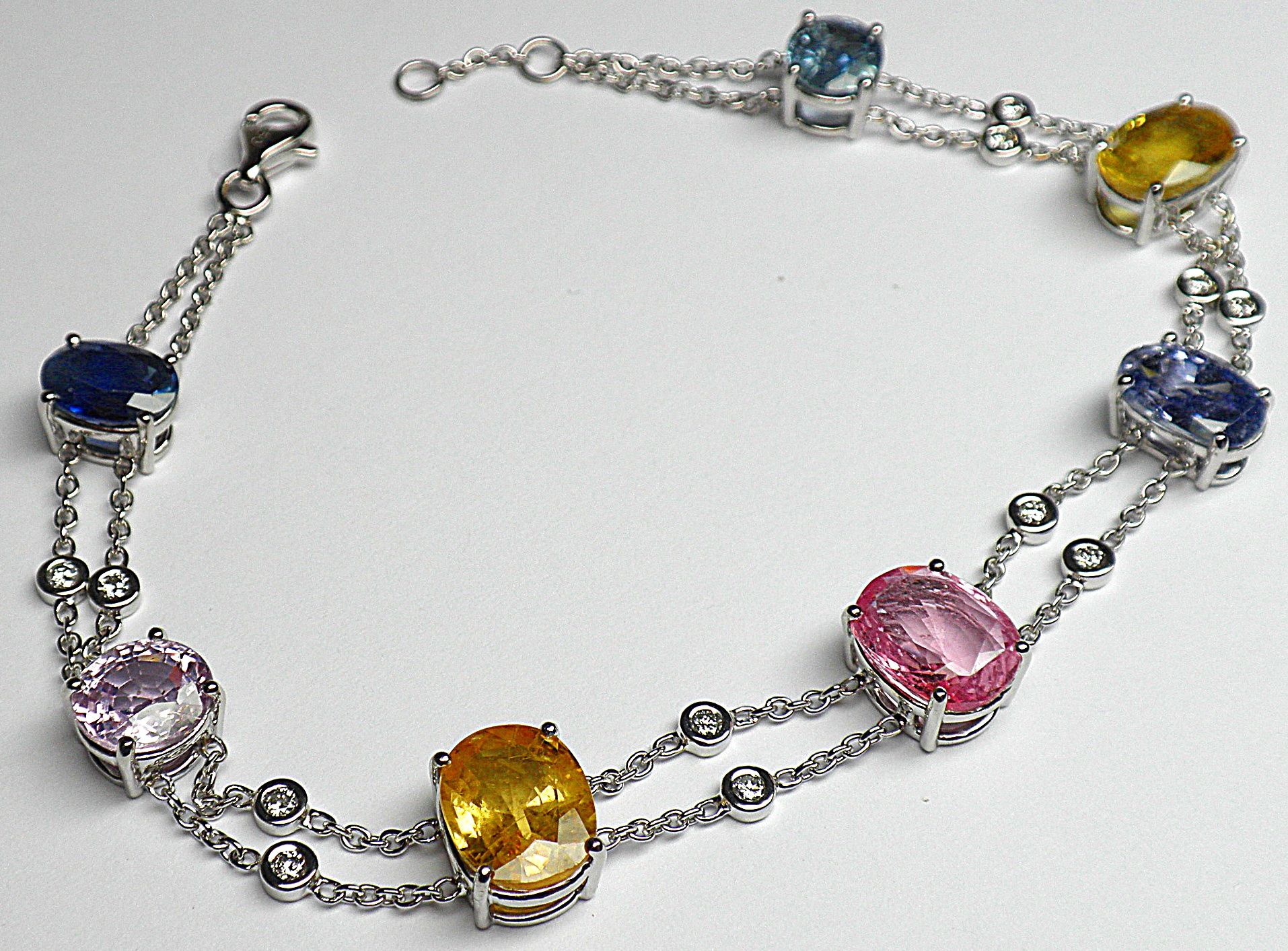 Null Charming white gold bracelet set with 7 multicolored Ceylon sapphires of NA&hellip;