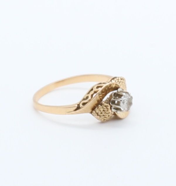 Null BEWEGTER RING IN GELBEM GOLD MIT DIAMANT VON ca. 0,20 ct.
Punze mit Adlerko&hellip;