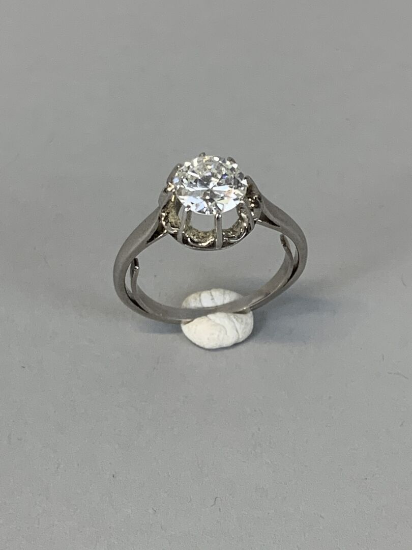 Null Solitaire ring in platinum set with a 1/2 cut diamond calibrating about 1.2&hellip;