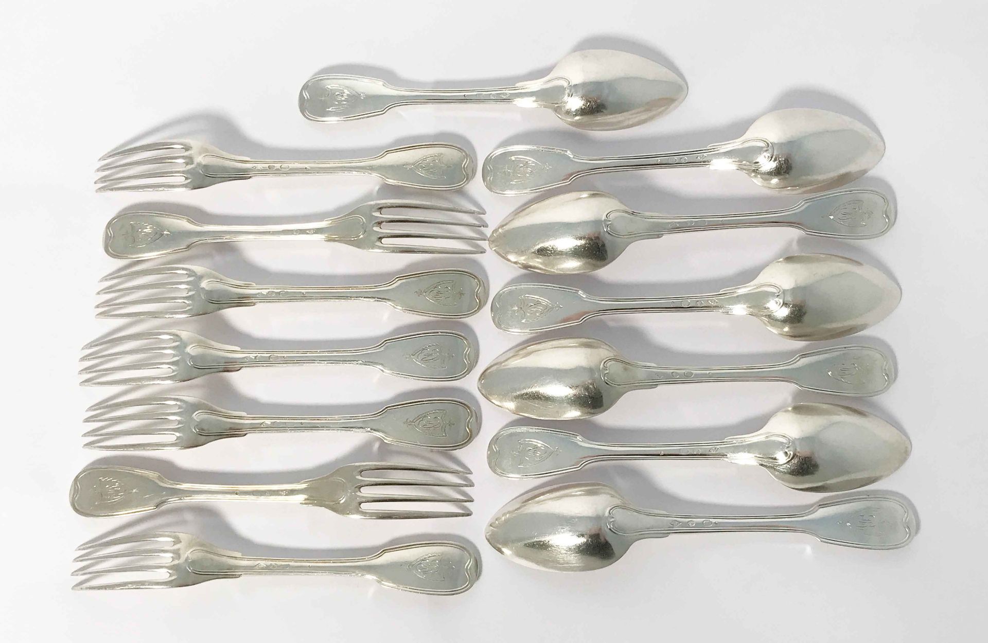 Null Set of seven silver flatware. Paris 1798-1809 Model with nets, engraved wit&hellip;