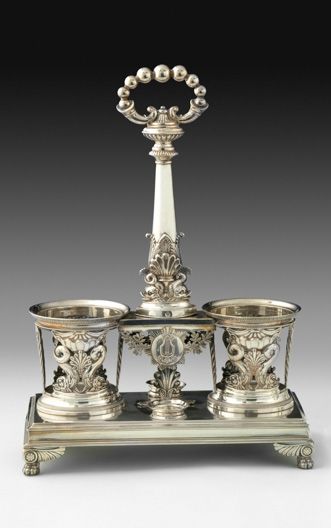 Null 
Silver oil cruet holder. Paris, 1819-1838. The rectangular base rests on c&hellip;