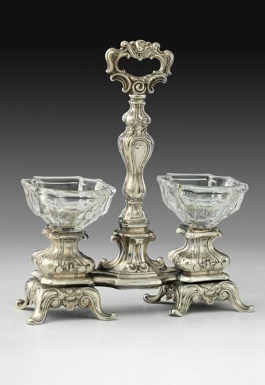 Null Double silver salad bowl. Circa 1880. It rests on eight scrolled feet, the &hellip;
