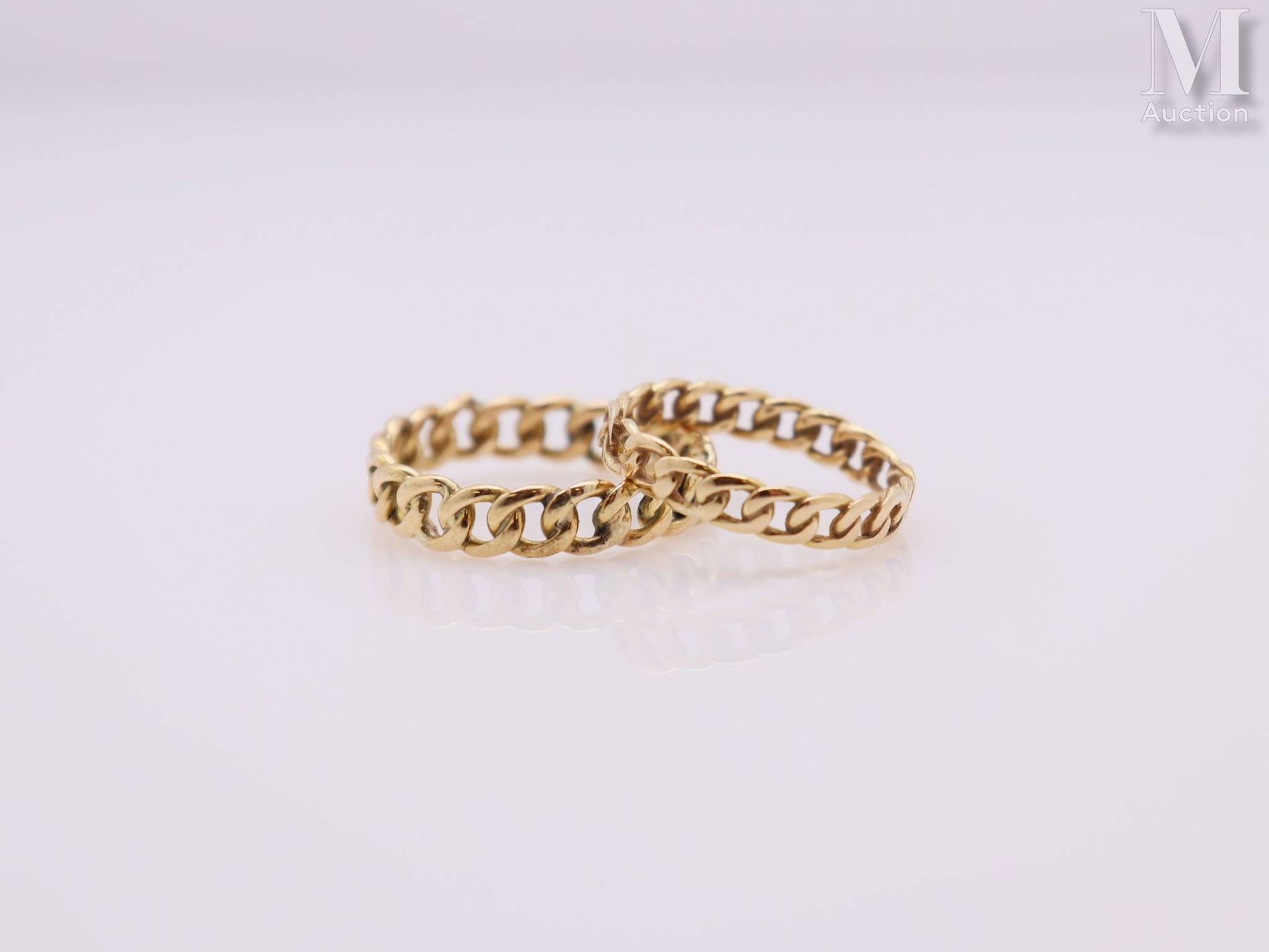 Deux alliances à maillons entrelacés Two wedding rings in yellow gold 18k (750 t&hellip;
