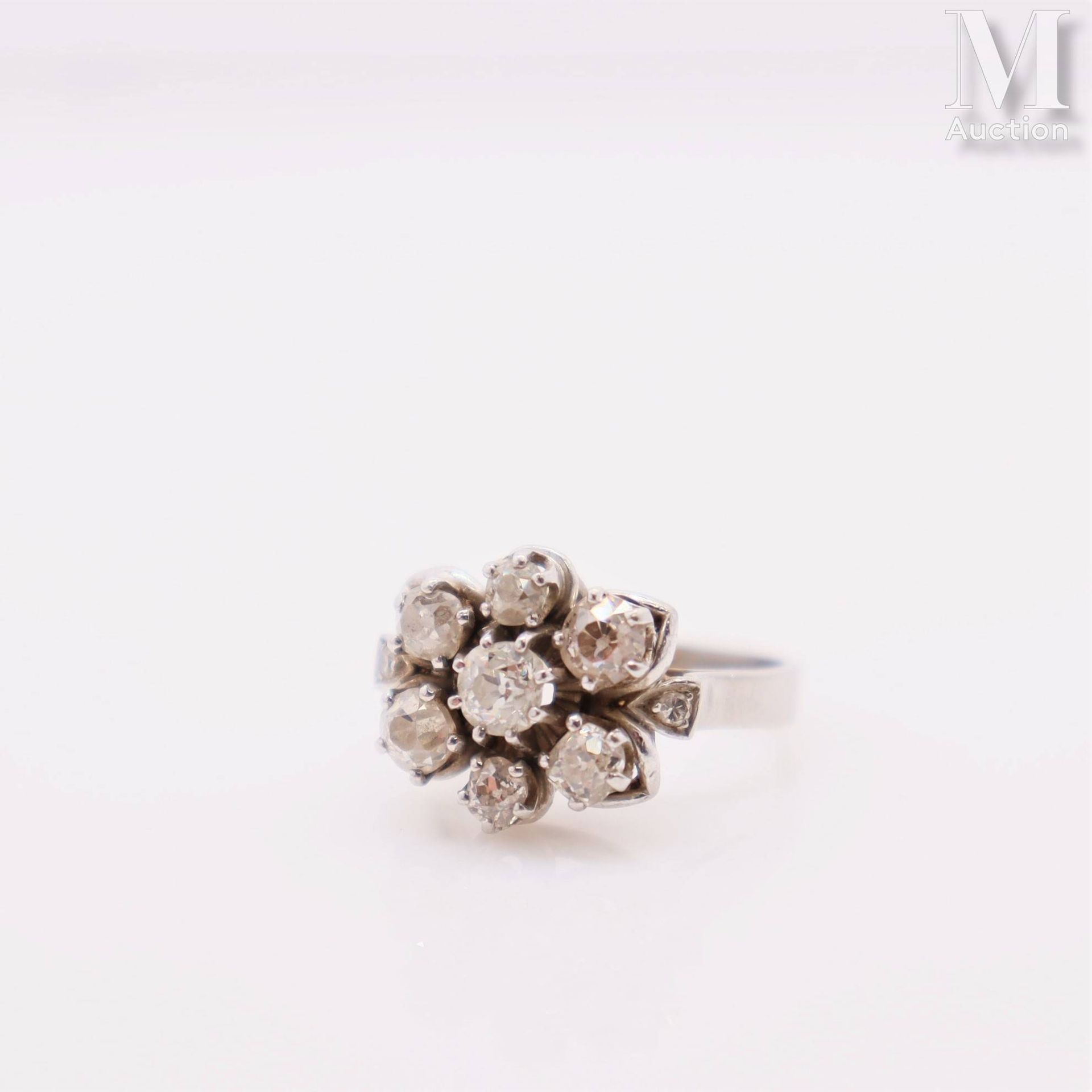 Bague marguerite Bague marguerite en or gris 18k (750 millièmes) et platine (950&hellip;