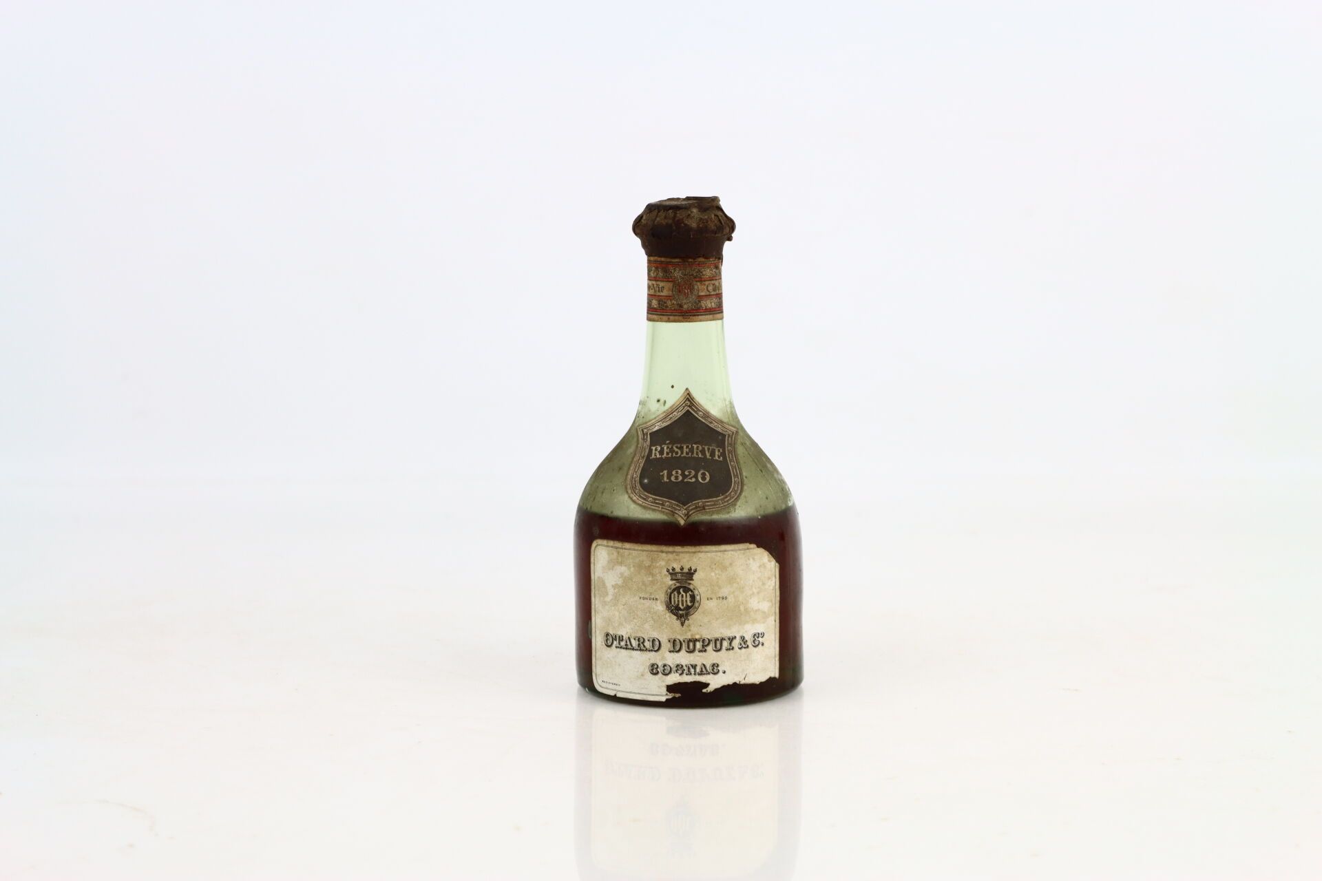 Null 1 bouteille de COGNAC "Réserve 1820" de OTARD DUPUY & Co, 35 cL (présumé) i&hellip;