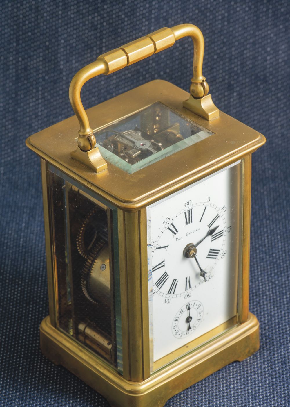 Paul GARNIER (1834-1916), 海军钟表师，巴黎钟表工会主席，约1875年

鎏金铜质军官钟。铰链式手柄，侧面，顶部和镂空的背面。签名的白色&hellip;