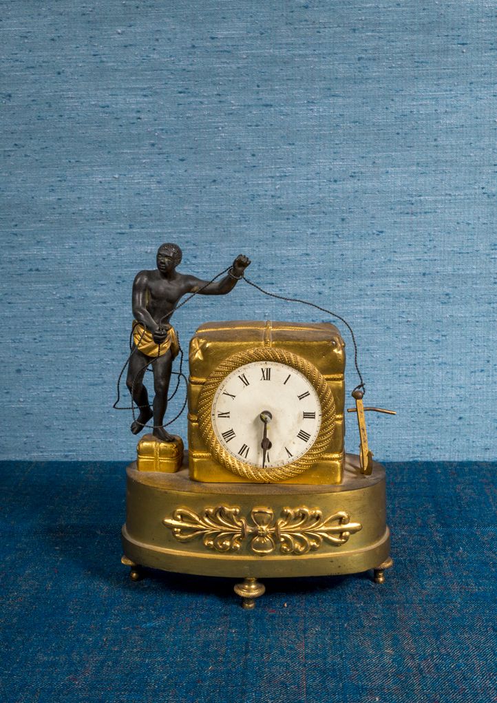 Null Clock called "à la balle de coton" presenting a Nubian in bronze with black&hellip;