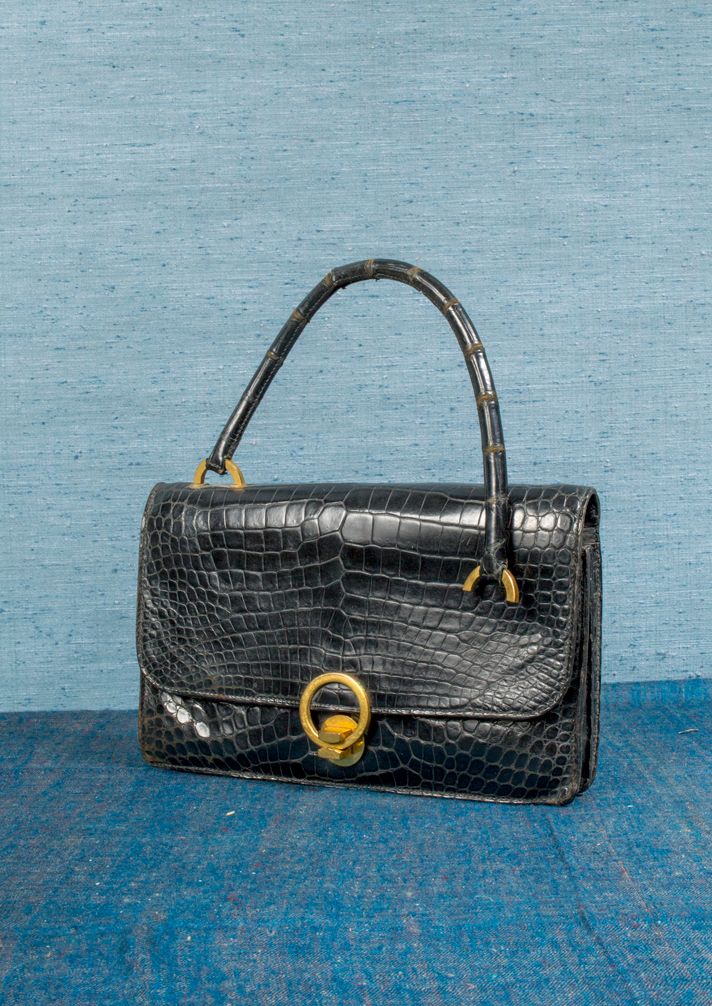 HERMES, Paris, HERMES, Paris,

Vintage handbag in black crocodile

16,5 x 25,5 c&hellip;