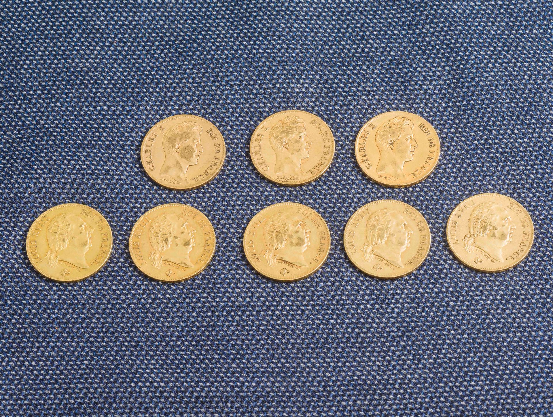 Null 一批8枚40法郎的金币，包括5枚1816年和1818年的路易十八金币（4枚）和3枚1830年的查理十世金币。

重量：102.8克