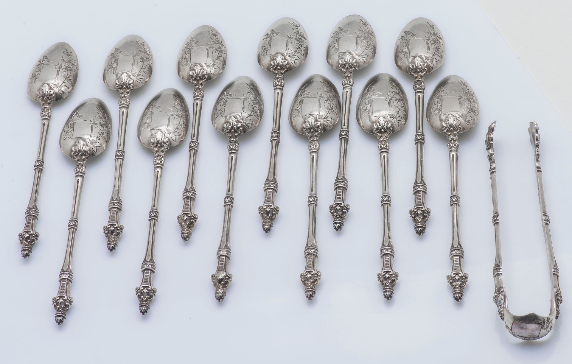 A. CALLE Fin XIXème siècle, début XXème siècle Set of eleven small spoons and a &hellip;