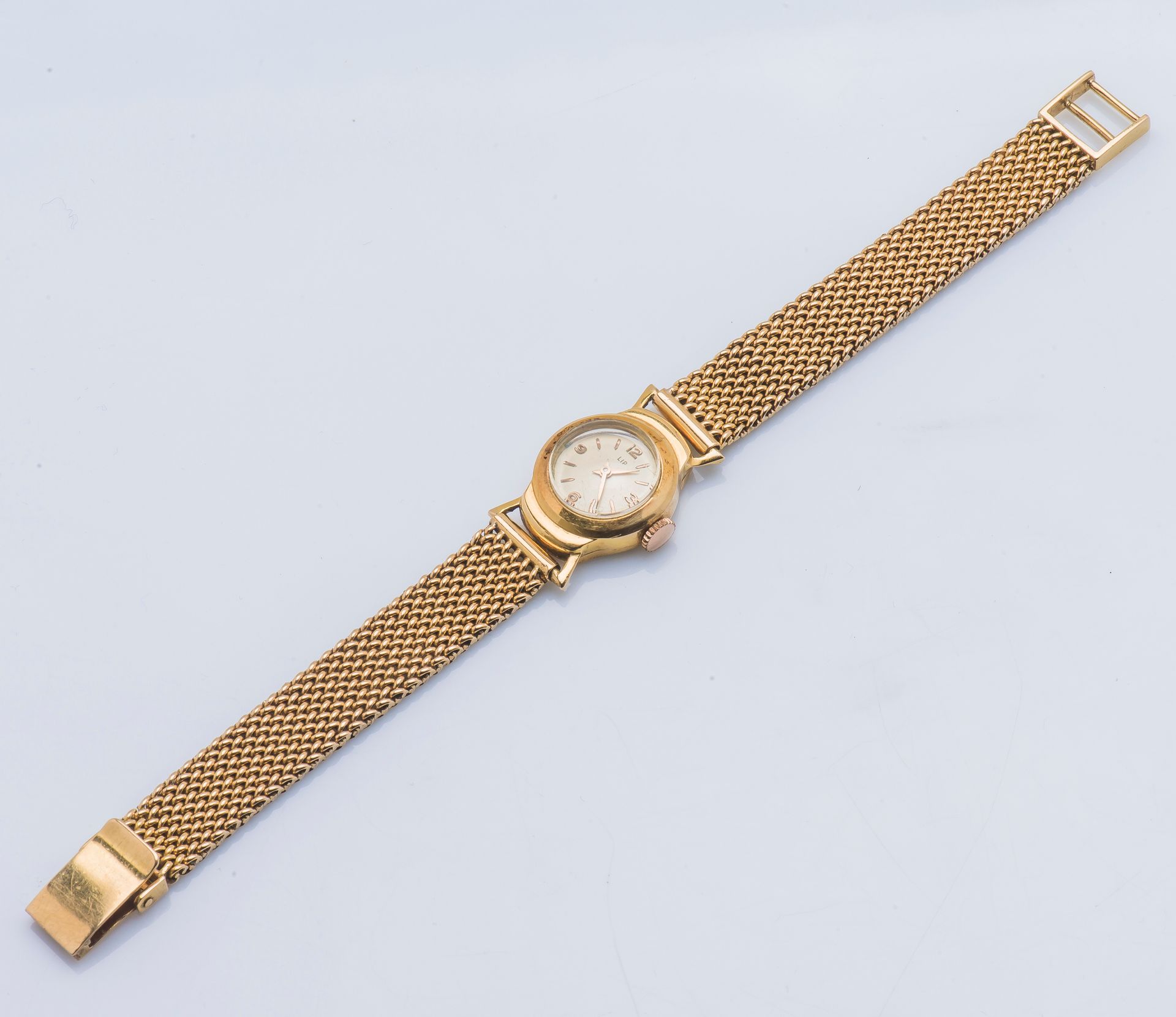 LIP 
Lady's watch in yellow gold 18 carats (750 thousandths). The round case wit&hellip;