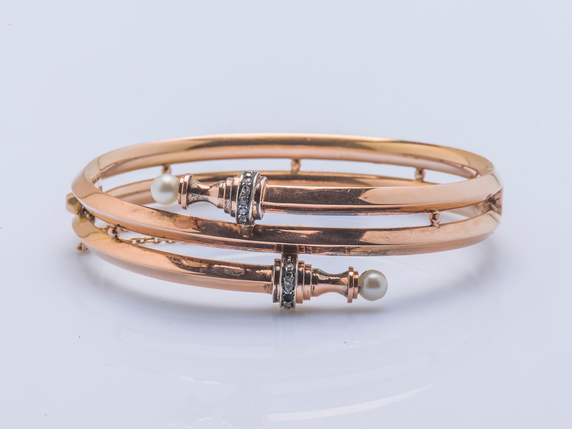 Null Rigid opening bracelet in pink gold 9 carats (375 thousandths) drawing a wi&hellip;