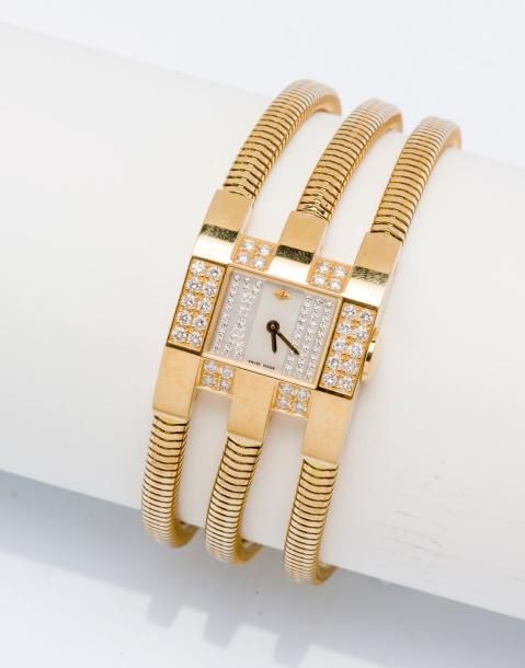 VAN CLEEF & ARPELS Bracelet montre de femme en or jaune 18 carats (750 millièmes&hellip;
