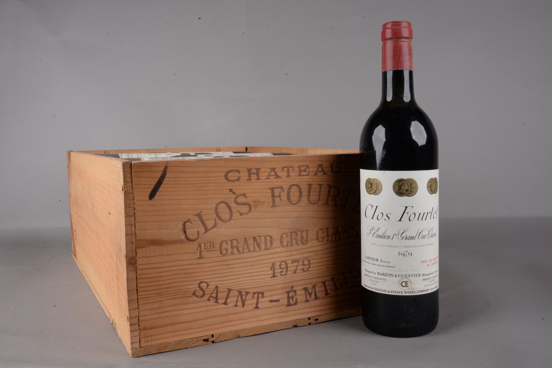 Null 12 bouteilles CLOS FOURTET, 1° Grand Cru St-Emilion 1979 (es, elt, etla, 4 &hellip;