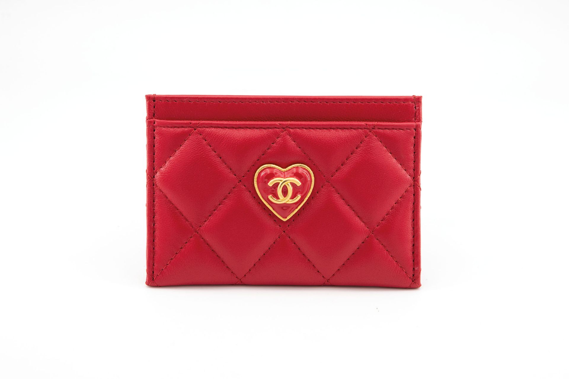 Red quilted leather cardholder Central in red leather wi…