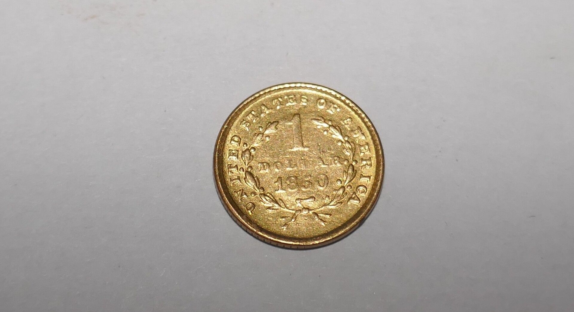 Null Una moneda de oro Liberty 1850 de 1 dólar, 1,6 gr.