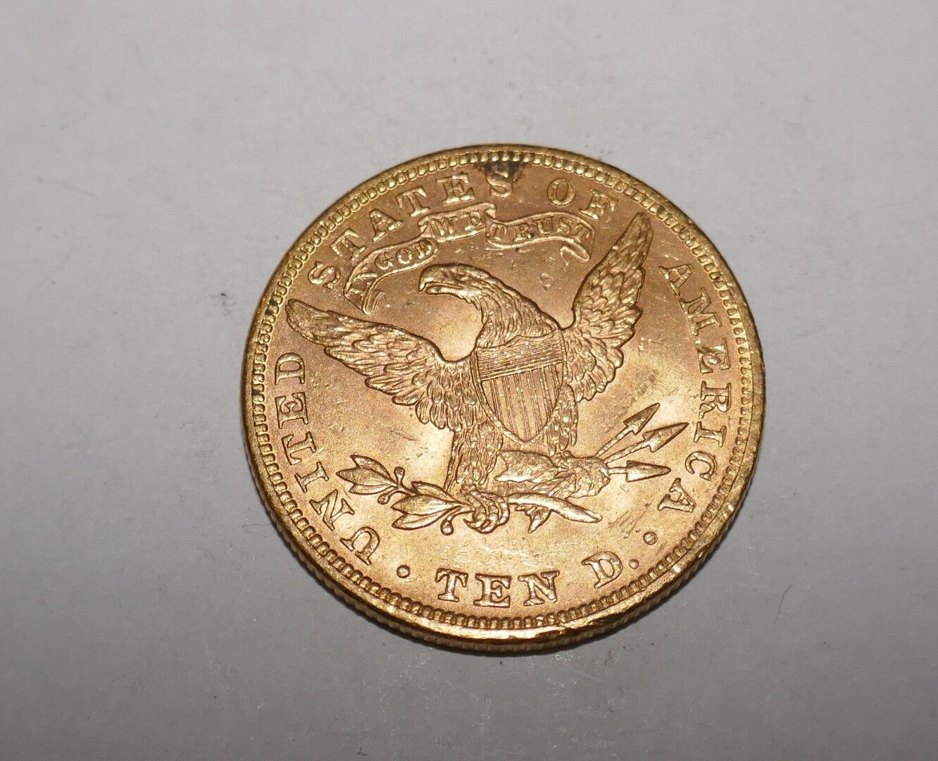Null 一枚Liberty 1894年10美元金币，重16.8克