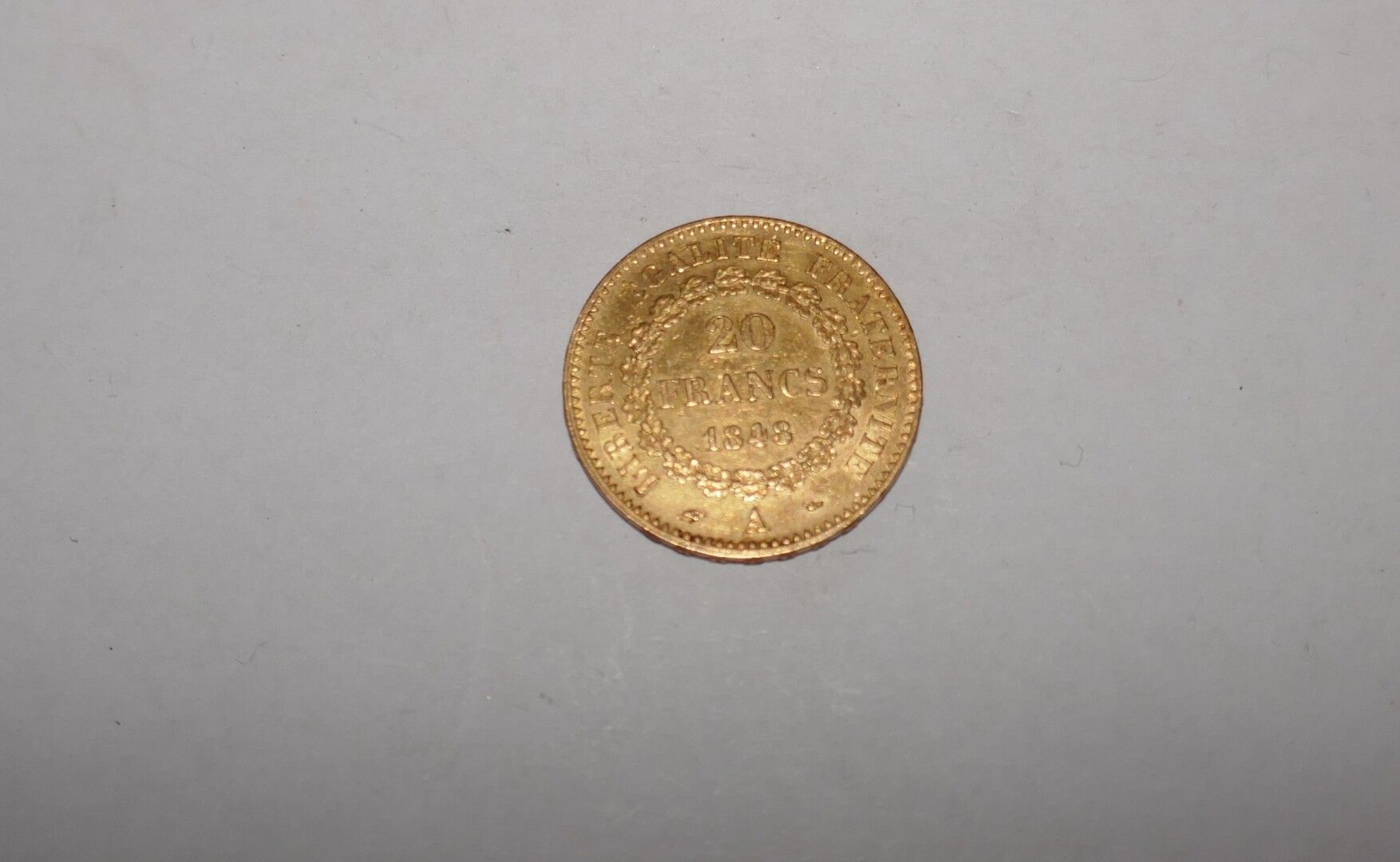 Null Una moneda de 20 francos de oro Genie 1848 A, 6,45 grs