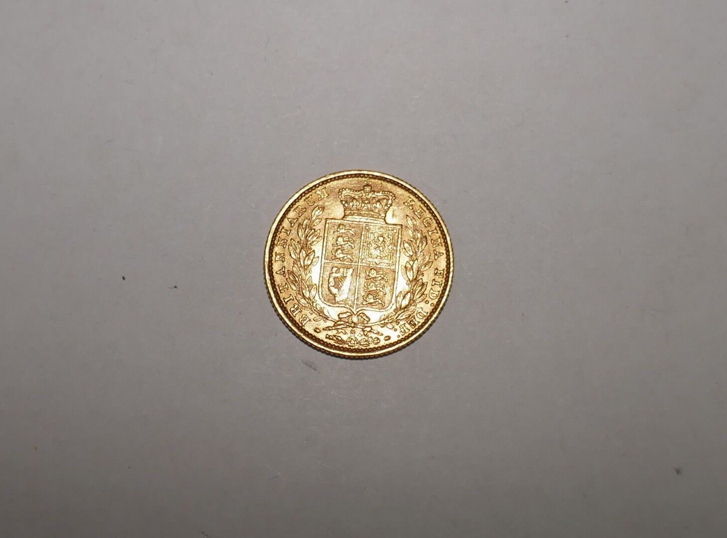 Null Ein goldener Sovereign 1885 Wappen, 7,99 grs